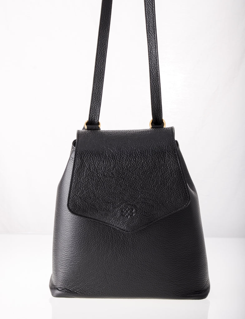 Our trending Kyla Joy Black Leather Long Handle Cross Body Convertible Backpack